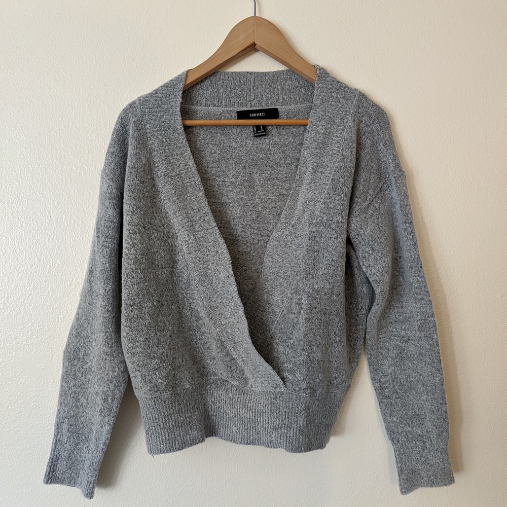 gray sweater with deep v line